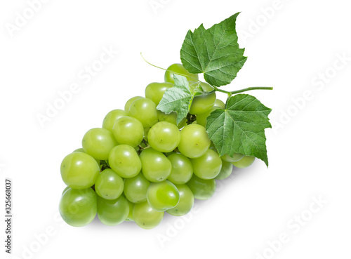 Green grape with leaves isolated on white. Shine Muscat Grape With clipping path.