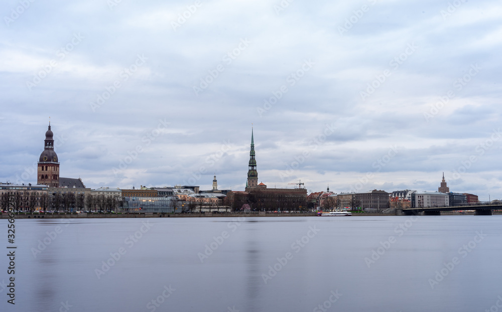 April 24, 2018 Riga, Latvia. View of the Old Town in Riga from the opposite bank of the Daugava River.