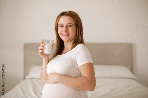 Pregnant woman drinks milk
