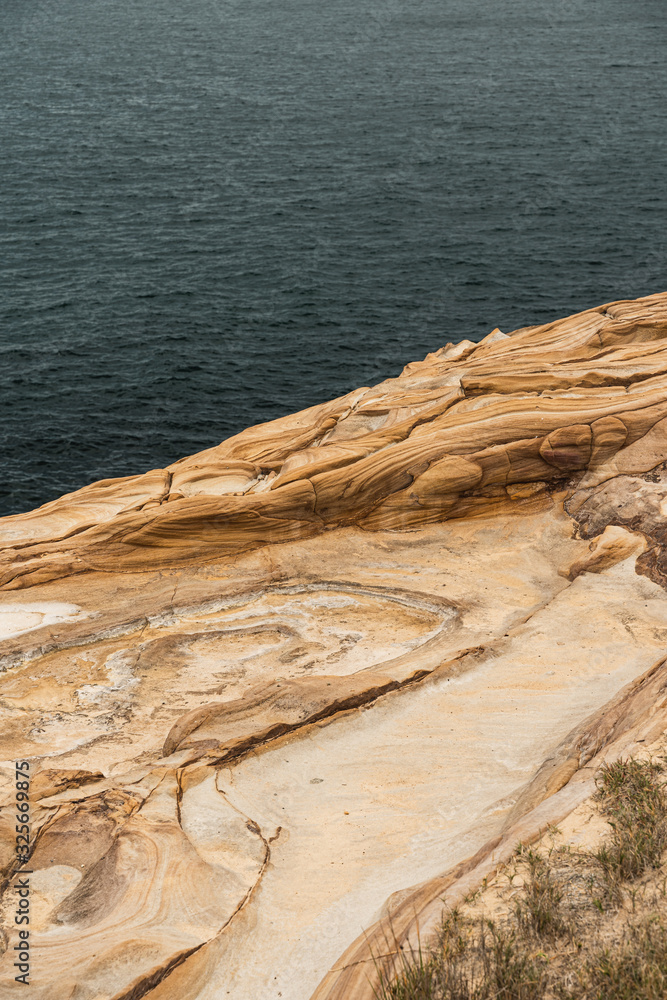 Detail shot of the sandstone waters edge in Bouddi National Park. Detail shot of the sandstone waters edge in Bouddi National Park.