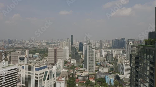 Bangkok Thailand Aerial v166 Flying low over Watthana and Soi Sukhumvit area with cityscape views - January 2020 photo