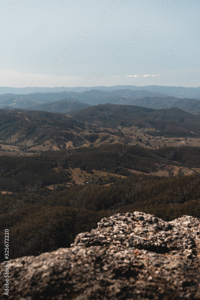 Fototapeta premium The countryside valley and mountain views from Mount Comboyne lookout, New South Wales.