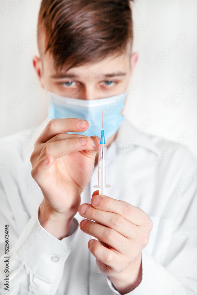 Young Man with a Syringe Young Man with a Syringe