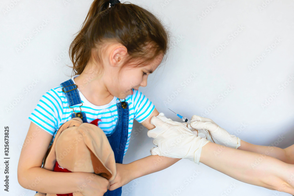Vaccination of children. Injection. Selective focus. Vaccination of children. Injection. Selective focus.