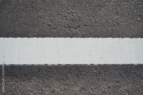 White traffic lane dividing line in Thailand