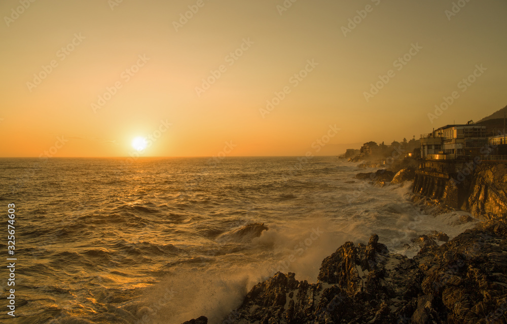 View of Genoa (Genova) Nervi, Italy, cliffs and walk at sunset