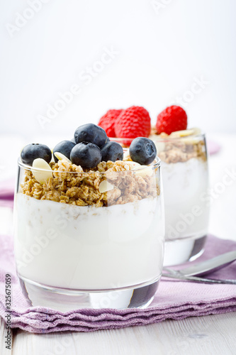 Fresh yogurt with muesli  rasberries and blueberries