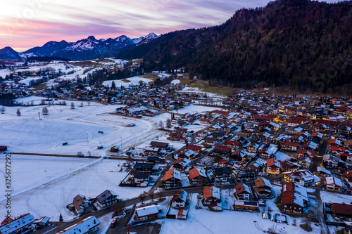 Aerial view, Snowy Reit im Winkl at dusk, Chiemgau, Upper Bavaria, Bavaria, Germany
