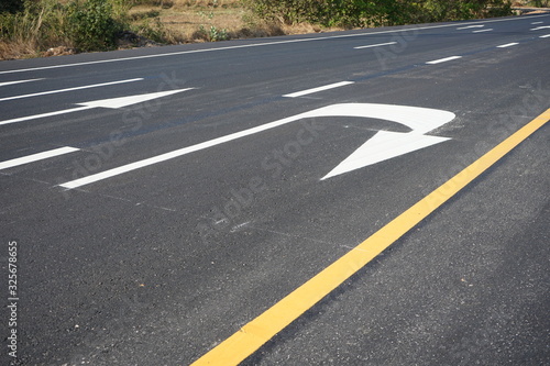 Arrows on asphalt roads and traffic lines in Thailand