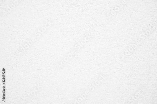 White natural pattern of paper texture cement or concrete wall for background and copy space for text.