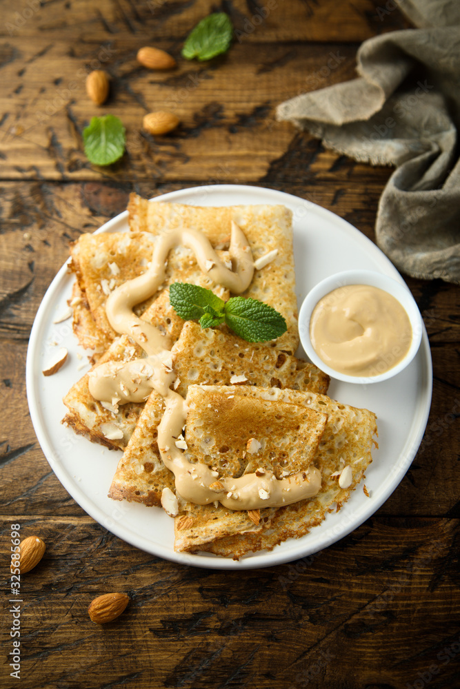 Homemade crepes with salted caramel sauce Homemade crepes with salted caramel sauce