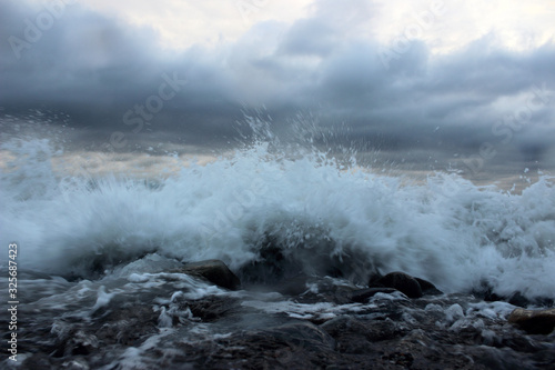 Fototapeta Naklejka Na Ścianę i Meble -  Stormy sea. Big wave and dark sky