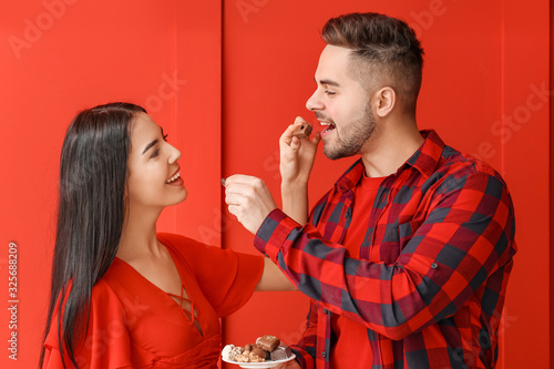 Beautiful young couple with...