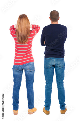 Back view couple in sweater.