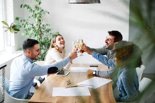 Photography champagne tost celebration success businesspeople office