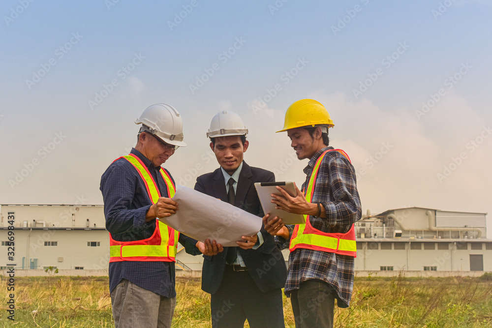 Manager project communication with Foreman Supervisor check on blueprint estate building construction Manager project communication with Foreman Supervisor check on blueprint estate building construction