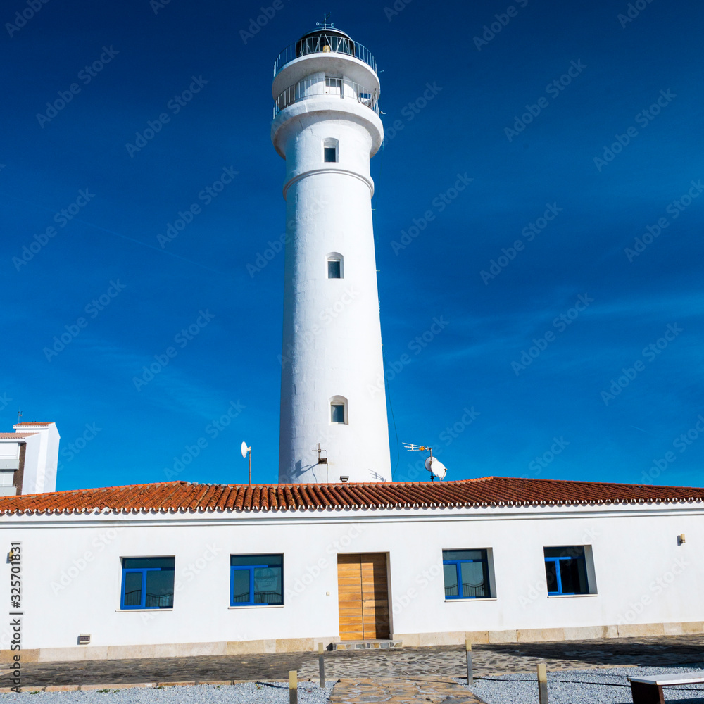 The lighthouse and beach in Torrox on the Costa Del Sol Spaon