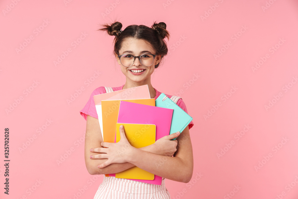 lovely happy teenage girl standing isolated over pink lovely happy teenage girl standing isolated over pink