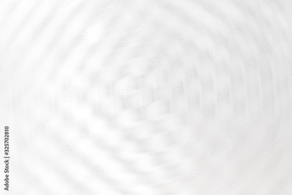 Obraz premium Abstract white and gray bokeh lights background with blur texture