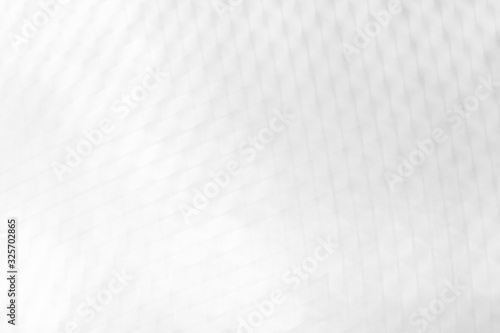 Abstract white and gray bokeh lights background with blur texture