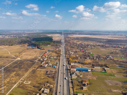 View from the drone of the asphalt road to the city. Ukraine.