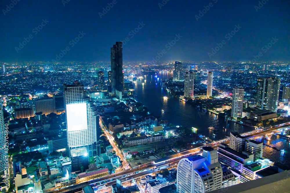 Fototapeta premium Aerial view of Bangkok Downtown Skyline at night, Thailand