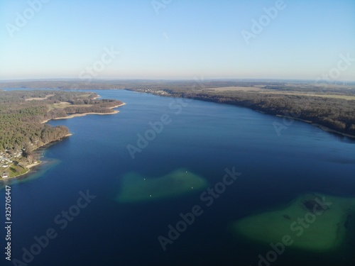 Aerial view of blue lake Werbellinsee, Barnim, Brandenburg, Germany © Sahara Frost