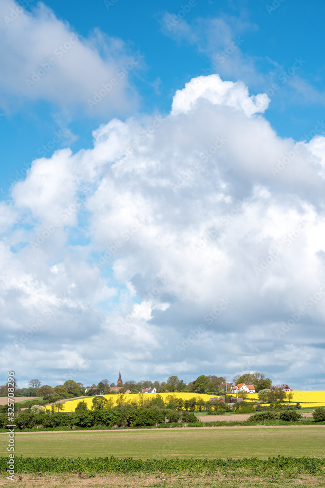 Ven island in southern Sweden with field of rapeseeds Ven island in southern Sweden with field of rapeseeds