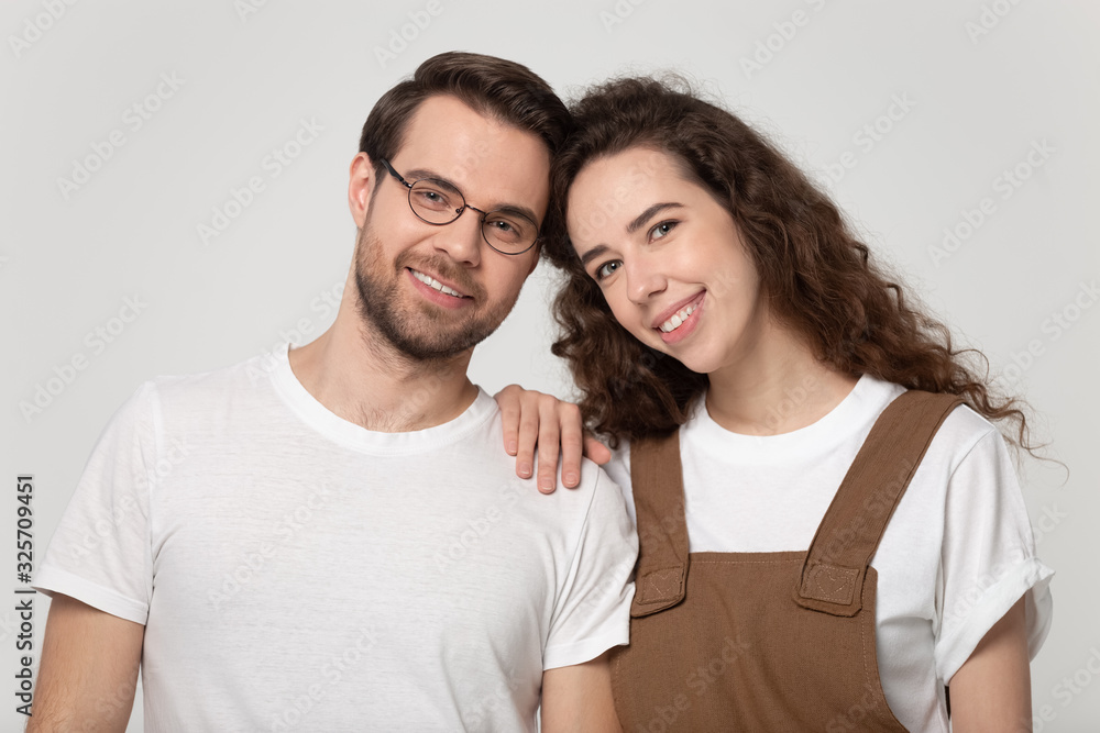 Head shot close up portrait young romantic bonding family couple. Head shot close up portrait young romantic bonding family couple.