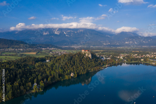 Aerial view of Bled Castle in front in Bled Lake, Slovenia