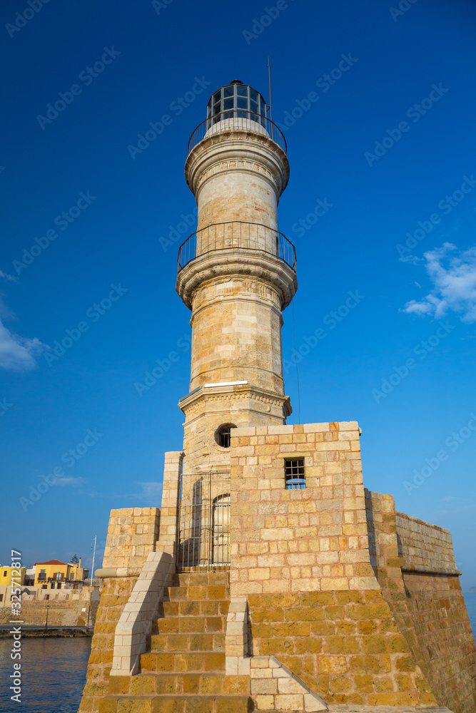 Lighthouse in the port of Chania at sunrise on Crete, Greece