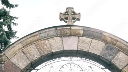 Stone Cross at the entrance gate of the monastery