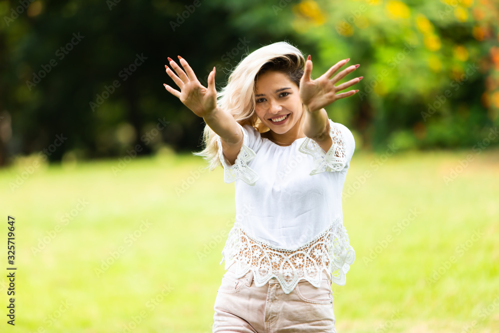 Freedome Happy young beautiful Woman Enjoying life at Nature park concept. Freedome Happy young beautiful Woman Enjoying life at Nature park concept.