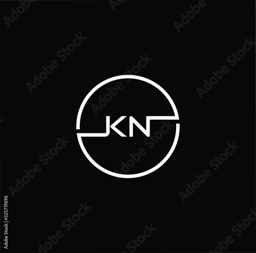 Minimal elegant monogram art logo. Outstanding professional trendy awesome artistic KN NK initial based Alphabet icon logo. Premium Business logo White color on black background