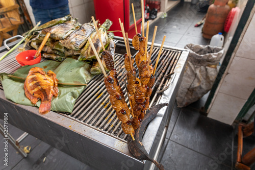 Edible palm weevil larvae (Rhynchophorus phoenicis) at traditional food market in Puerto Francisco de Orellana. Ecuador. Amazon. photo