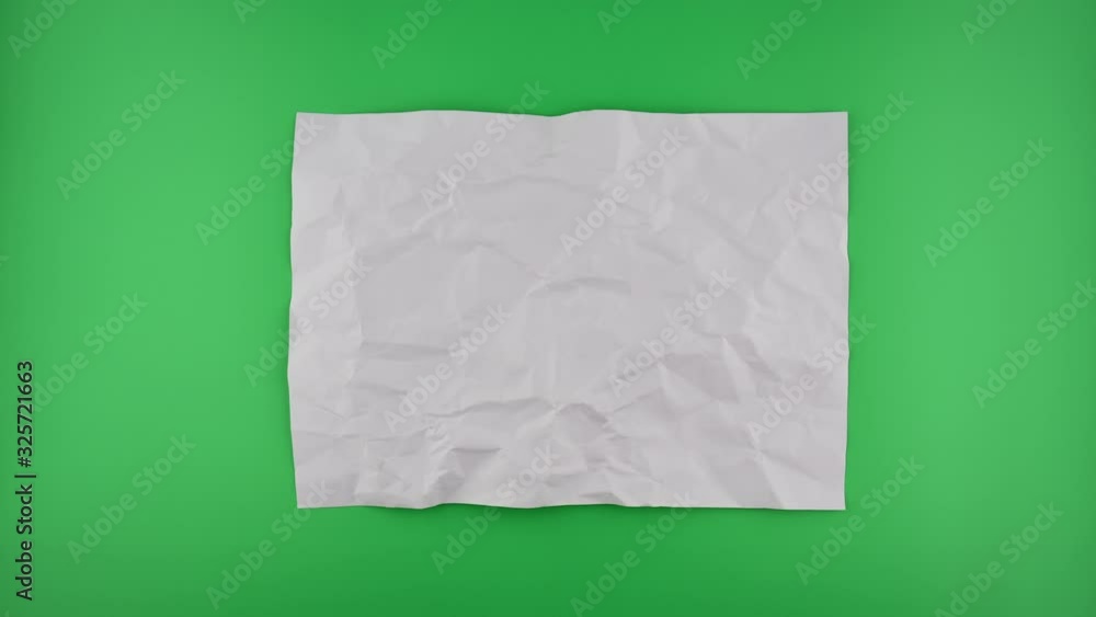 Stop motion VDO, paper ball unwrapping on green background.