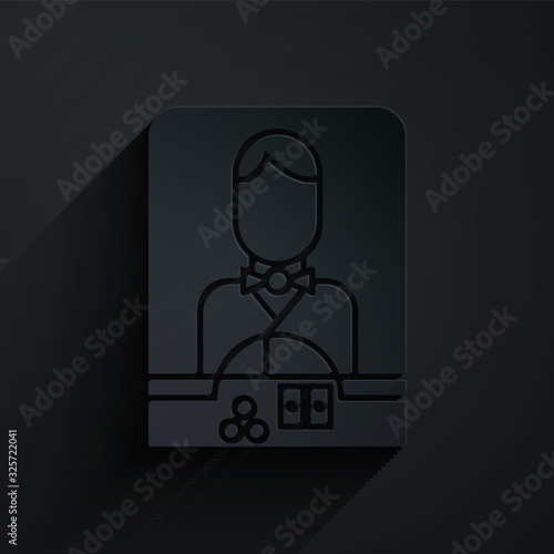 Paper cut Casino dealer icon isolated on black background. Casino croupier. Paper art style. Vector Illustration