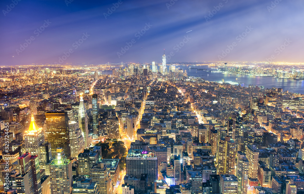 New York City, USA. Night aerial view of Midtown and Downtown Manhattan skyscrapers from a high viewpoint