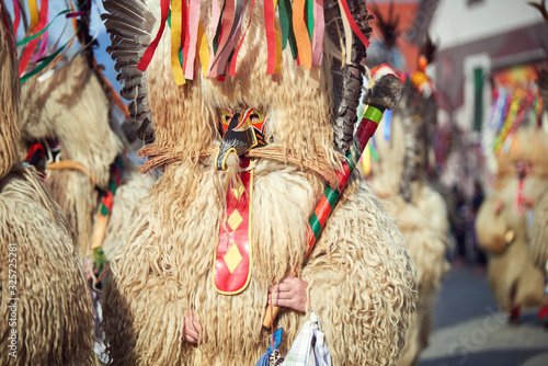 Colorful face of Kurent, Slovenian traditional mask, carnival time photo