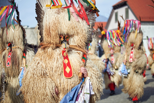 Colorful face of Kurent, Slovenian traditional mask, carnival time photo