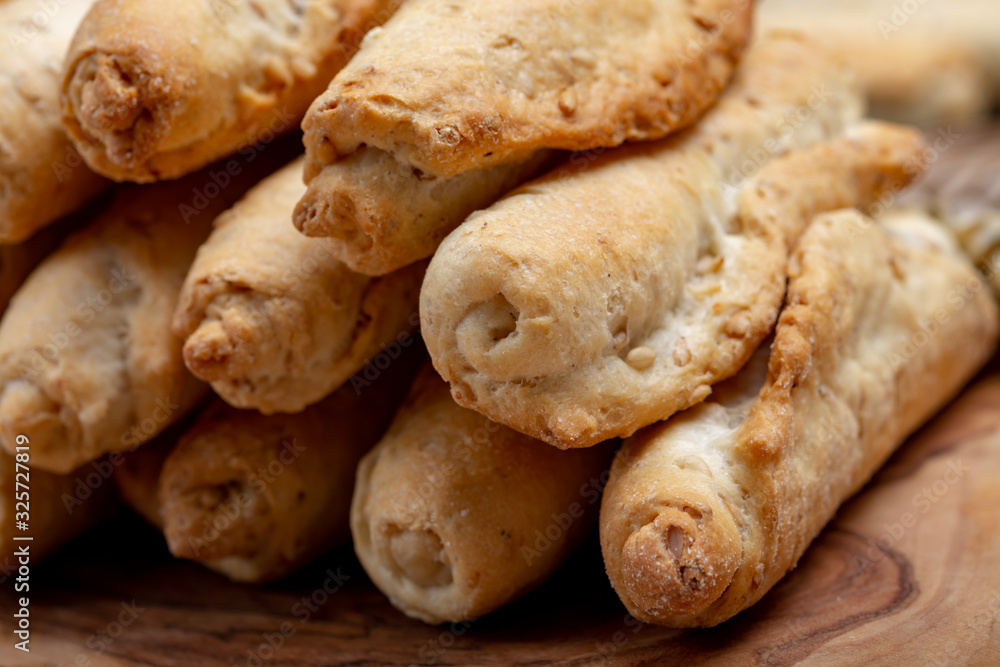 Small italian bread rolls crostini made from wheat dough with sesame Small italian bread rolls crostini made from wheat dough with sesame