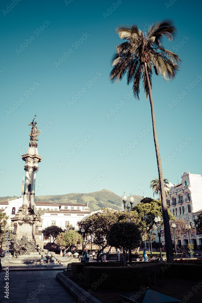 QUITO, ECUADOR - FEBRUARY 07, 2020: Plaza Grande and Metropolitan Cathedral, historic colonial downtown of Quito, Ecuador. South America.