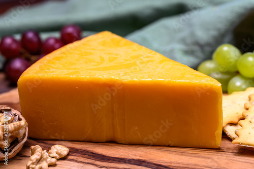 Cheese collection, yellow matured cheddar cheese triangle piece from England