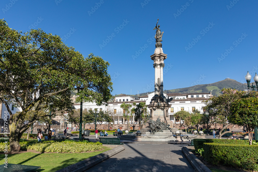 QUITO, ECUADOR - FEBRUARY 07, 2020: Plaza Grande and Metropolitan Cathedral, historic colonial downtown of Quito, Ecuador. South America.