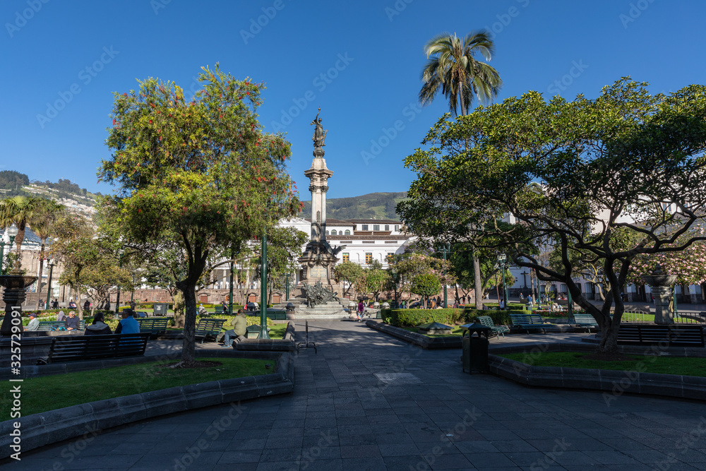 QUITO, ECUADOR - FEBRUARY 07, 2020: Plaza Grande and Metropolitan Cathedral, historic colonial downtown of Quito, Ecuador. South America.