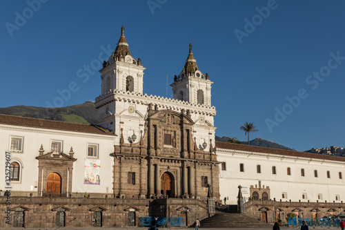 QUITO, ECUADOR - FEBRUARY 07, 2020: Plaza Grande and Metropolitan Cathedral, historic colonial downtown of Quito, Ecuador. South America.