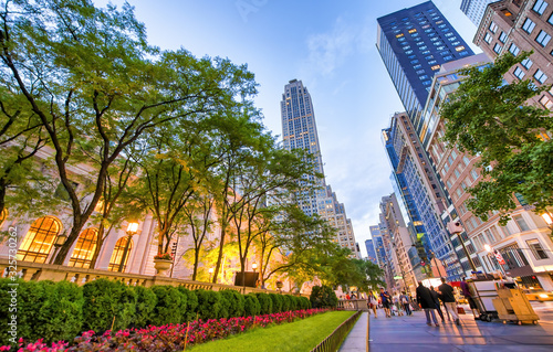 NEW YORK CITY - JUNE 2013: Exterior view of New York Public Library and Fifth Avenue at sunset