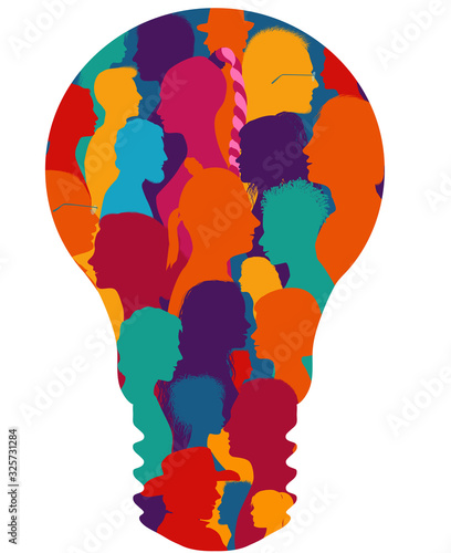 Group of diverse people silhouette in profile forming a light bulb.Community.Multiethnic multicultural society and population.Friendship and organization.Talking people.Human figures