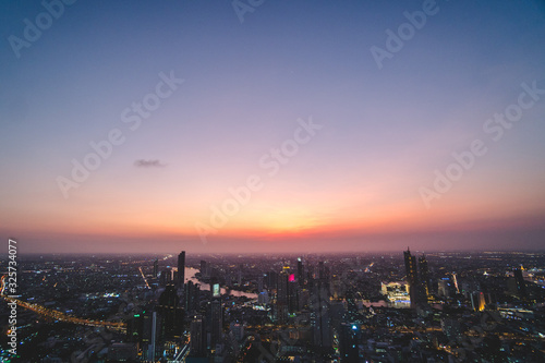 Aerial view of Bangkok city at sunset, from Mahanakhon SkyWalk, Thailand, Asia © icephotography
