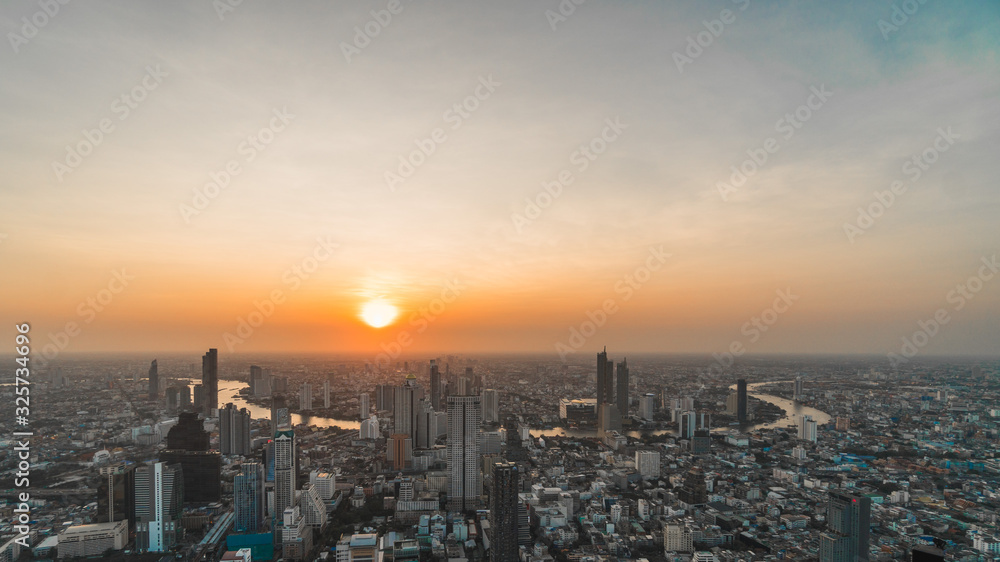 Fototapeta premium Aerial view of Bangkok city at sunset, from Mahanakhon SkyWalk, Thailand, Asia
